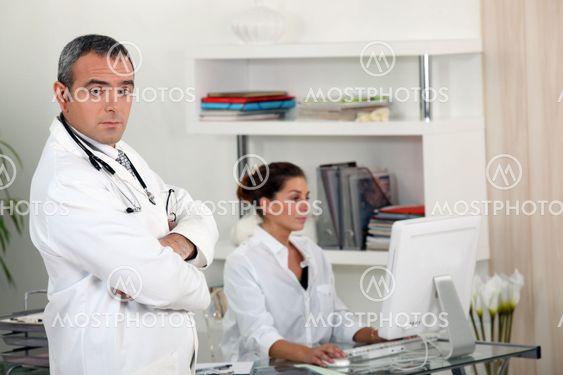 Doctor with his secretary