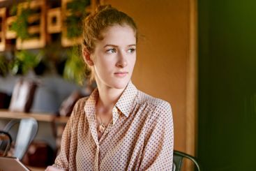 Planning, remote work and thinking with woman in coffee...