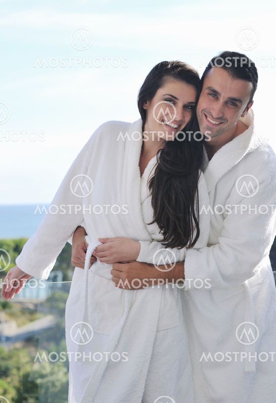 couple relaxing on balcony