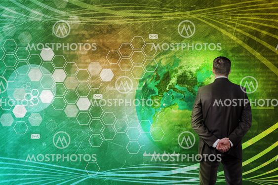Businessman in front of world map
