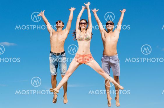 young friends jumping