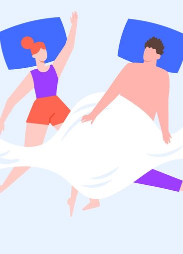 Romantic couple sleeping together in bed under blanket,...