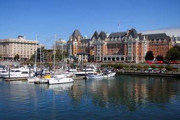 Victoria harbor with the traditional hotel and floating...