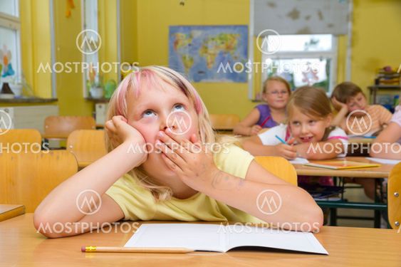 Schoolgirl yawning