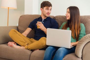 Watching something on a laptop