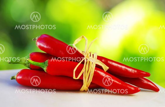 Red hot chili peppers tied with rope