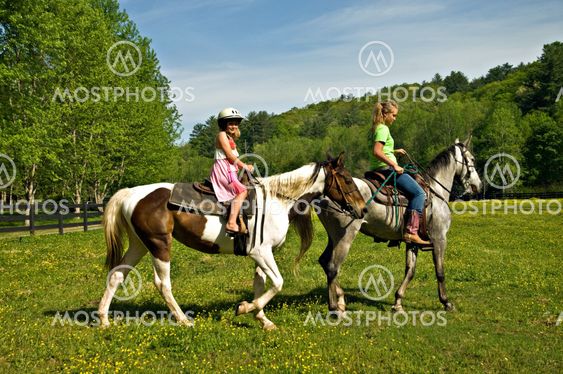 Girls Riding Horses