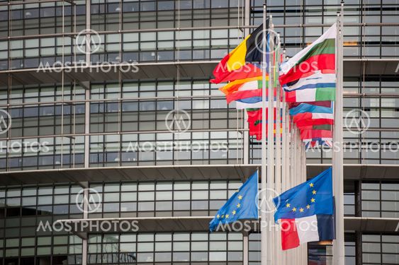 European Union Flags and France flag flies at half-mast