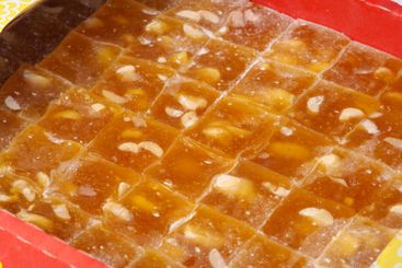 Deliciously prepared traditional Indian sweet cut into...