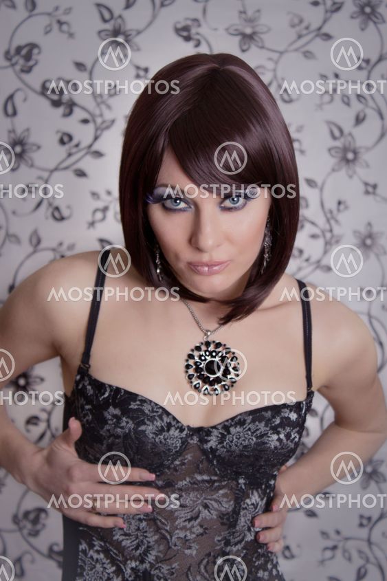 Seductive retro styled brunette in corset