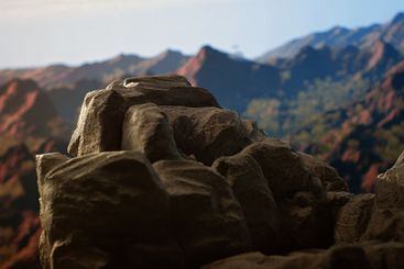 Picturesque mountain summit with a rocky foreground...