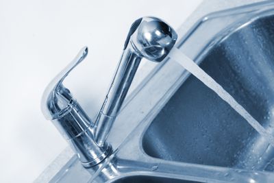 Kitchen Water tap and sink.