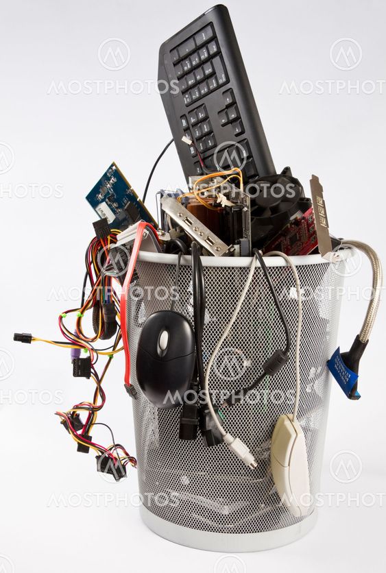 electronic scrap in trash can