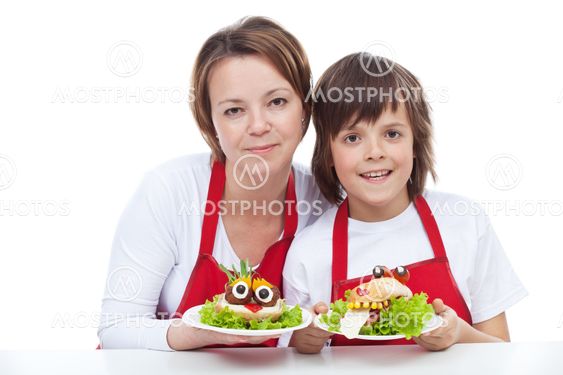 Woman and boy presenting their creative sandwiches