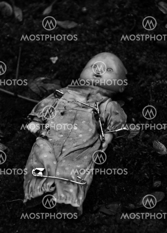 doll and pins