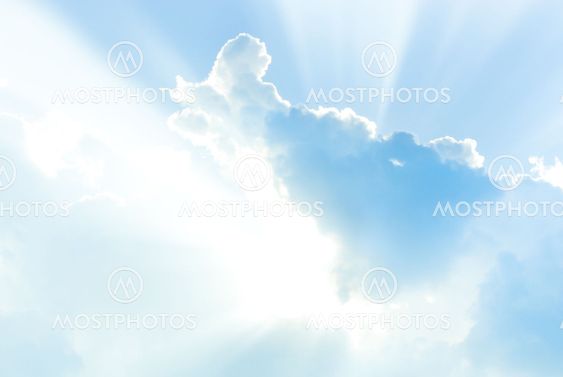 Blue sky with clouds and sunlight
