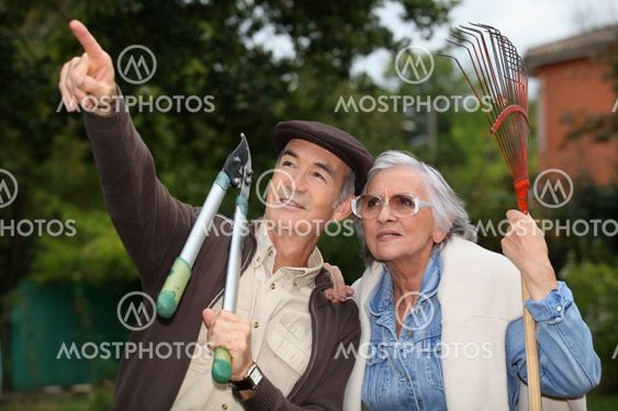 mature couple gardening