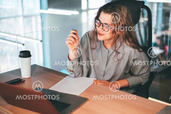 Girl making a video call at the office