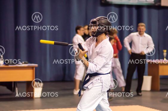 Kobudo competition men with nunchaku
