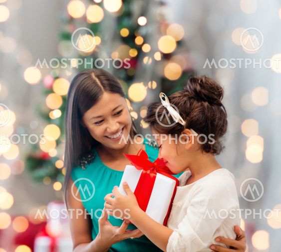 happy mother and little girl with gift box