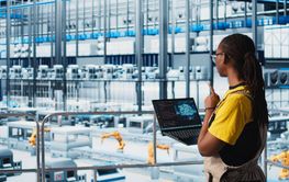 Engineer in smart factory using augmented reality to...