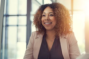 Happy, business woman and pride with computer for...