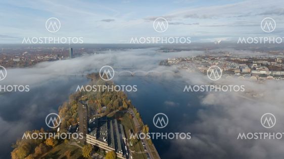 Riga Latvia Daugava river Zakusala island smoke cloud...
