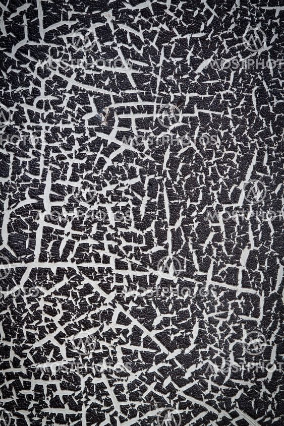 The old cracked paint on a wall surface