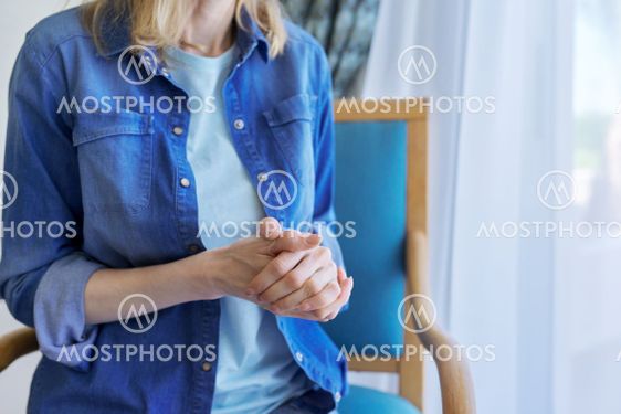 Close-up of praying woman's hand. Faith, religion,...