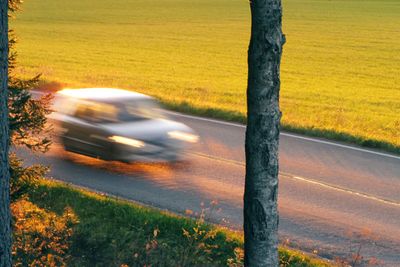 Car driving on road at countryside.