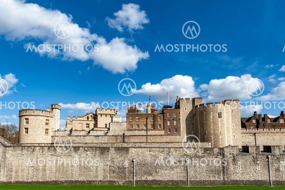 London, UK - April 2018: Exterior view of Her Majesty's Royal Palace and Fortress of the Tower of London, a historic castle and popular tourist attraction located on the north bank of the River Thames in central London, England