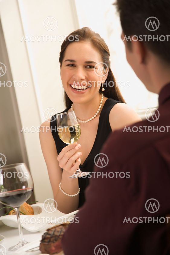 Couple drinking wine.