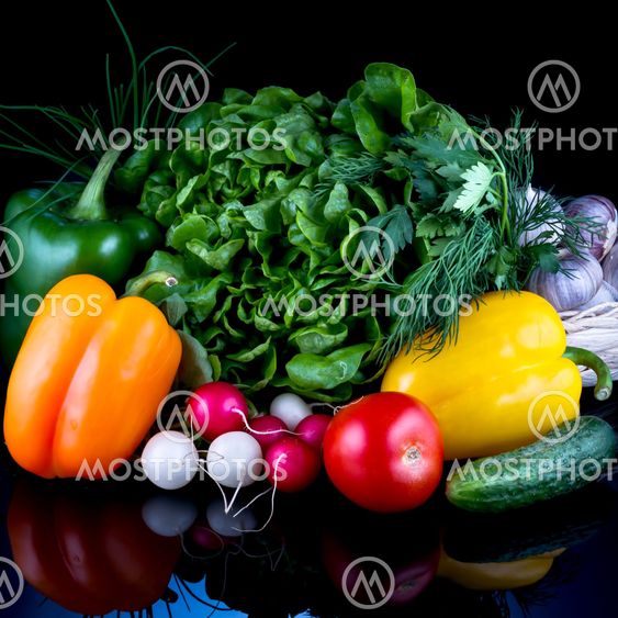 Fresh vegetables isolated on black background