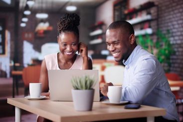 Coworkers Using Technology Lifestyle. Man And Woman...