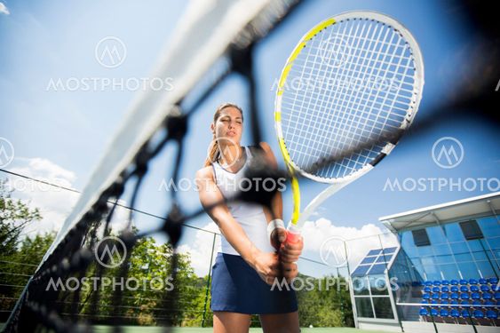 Young woman playing tennis