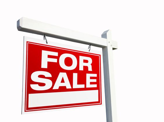 Red For Sale Real Estate Sign on White