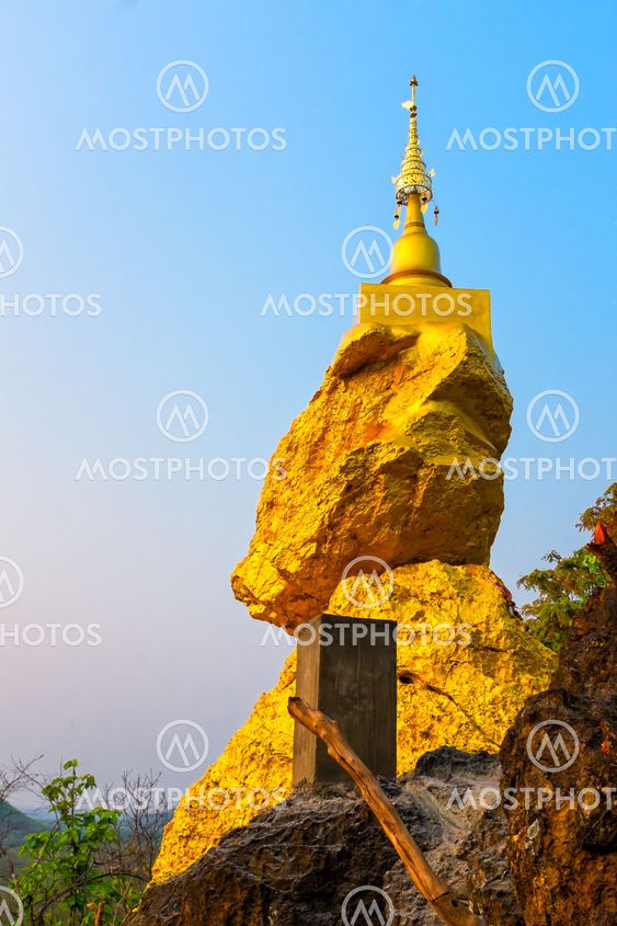 pagoda on rock stone with blue sky