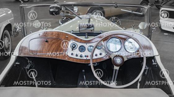 Dashboard detail of a vintage car.