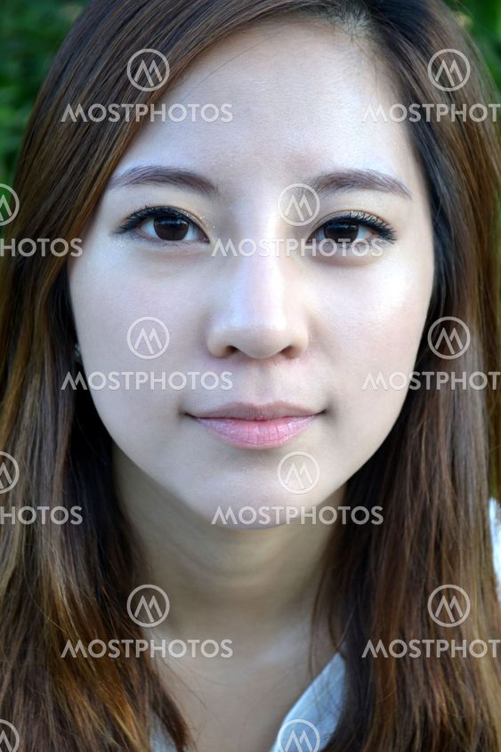 Attractive Young Asian Woman's Portrait, close-up