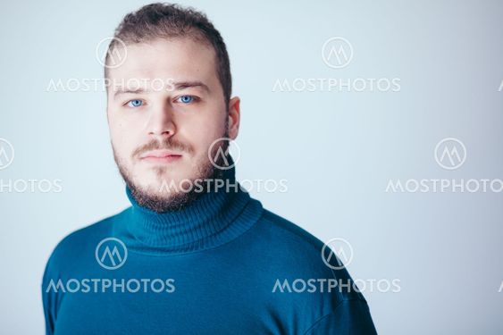 Portrait of a handsome bearded young man