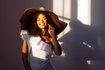 Close-up portrait of a young attractive smiling African...
