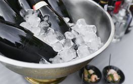 Champagne Bottles on Ice at a French Wedding