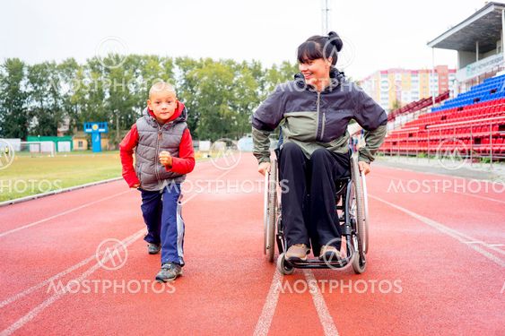 Disabled girl on a stadium