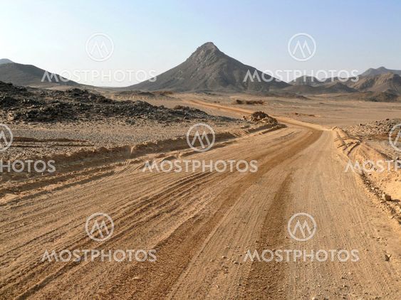 The road running through the Sahara desert.