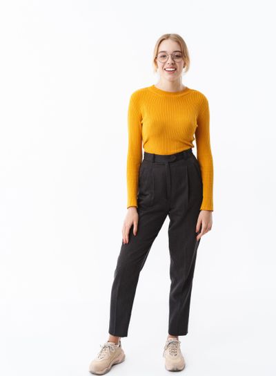 Full length of a smiling attractive young blonde woman