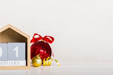 1 january. Christmas composition on colored background...