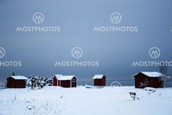Snowy old fishing cabins