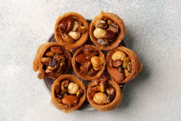 Traditional sweet delicacy made from rolled pastry and a...