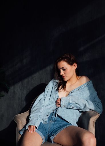 Beautiful Slim Brunette Woman in Denim Jacket Portrait