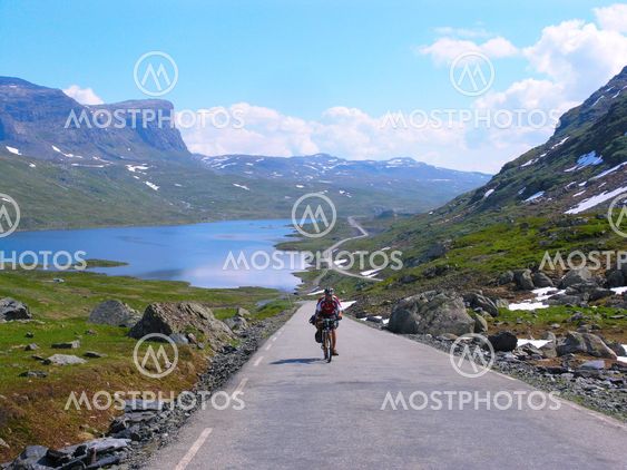 Mountain bike cyclist riding uphill